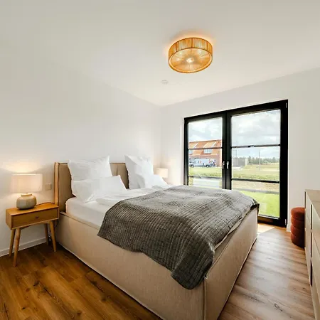 Holiday home Kuesten Hildes Huuske - Direkte Wasserlage, Aussensauna, Terrasse, 117qm, Neubaugebiet